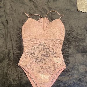 Blush pink going out bodysuit.